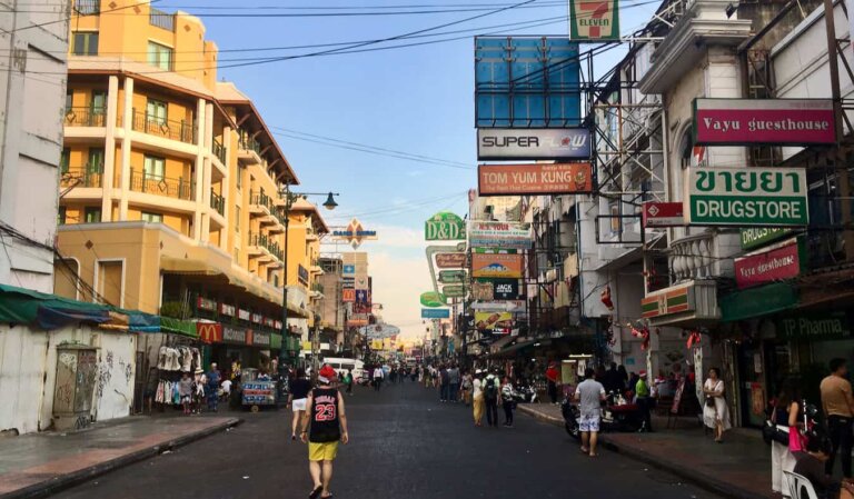 Backpackers on the famous Khao San Road, Bangkok's main party street, on a sunny day